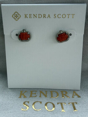 Kendra Scott's red pumpkin earrings